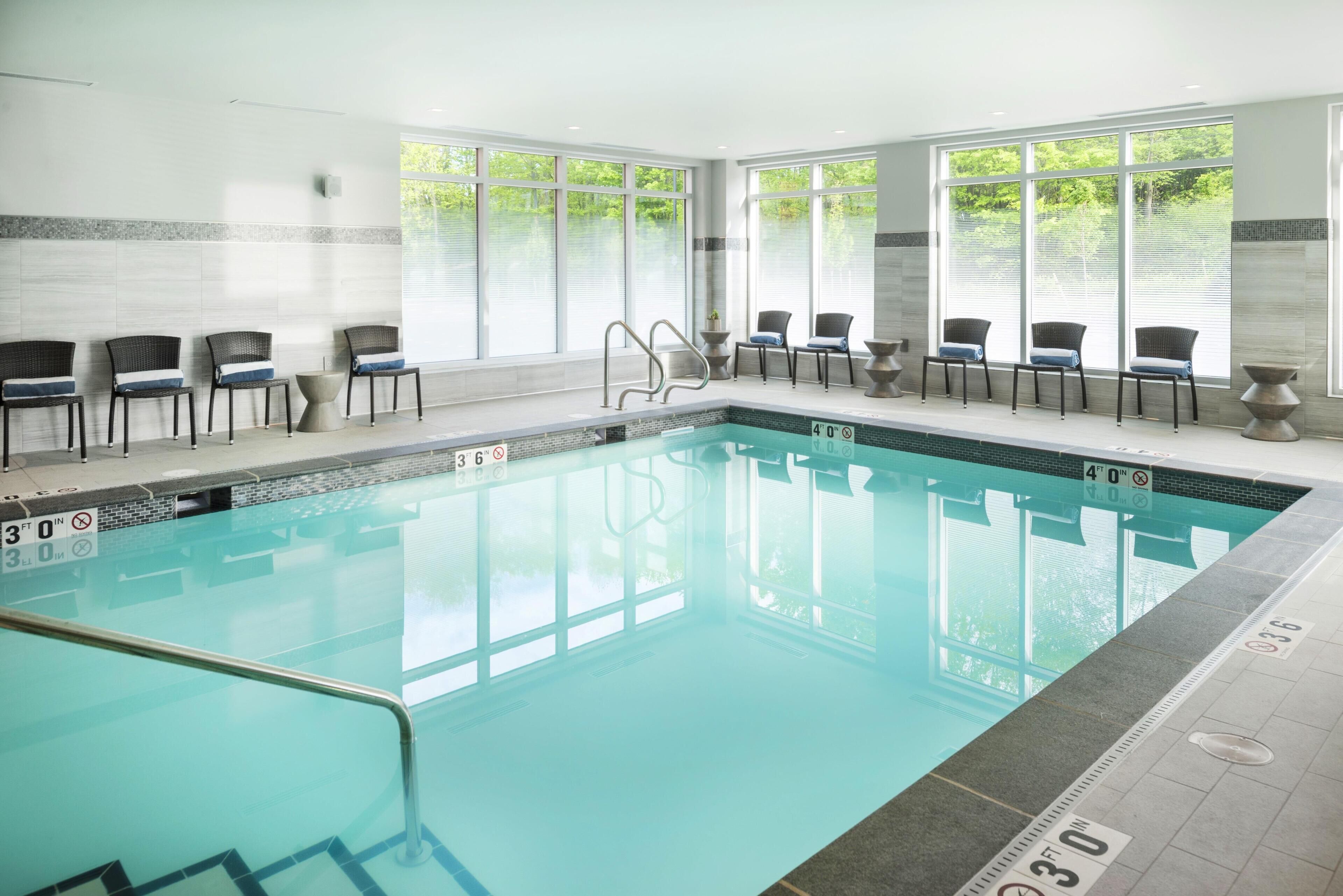 Indoor pool, open 7 AM to 10 PM, sun loungers