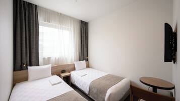 Habitación estándar con 2 camas individuales, para no fumadores | Tabla de planchar con plancha y wifi gratis