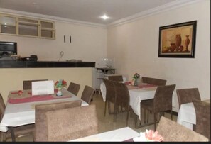 Breakfast, lunch, dinner served; local cuisine 