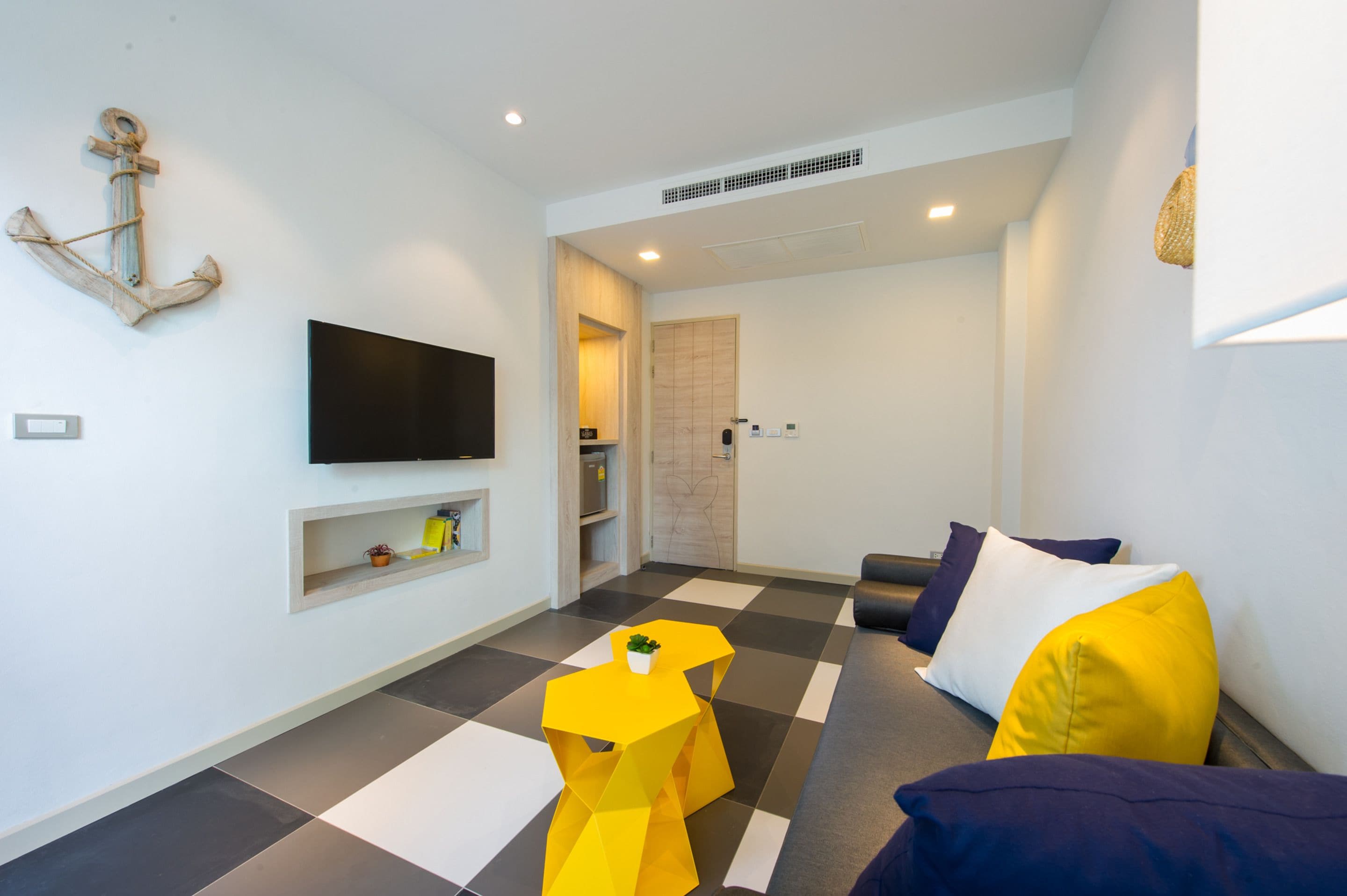 duplex pool access | living room | flat-screen tv