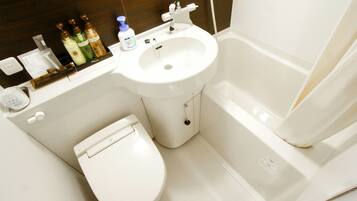 Combined shower/bathtub, hair dryer, electronic bidet, towels