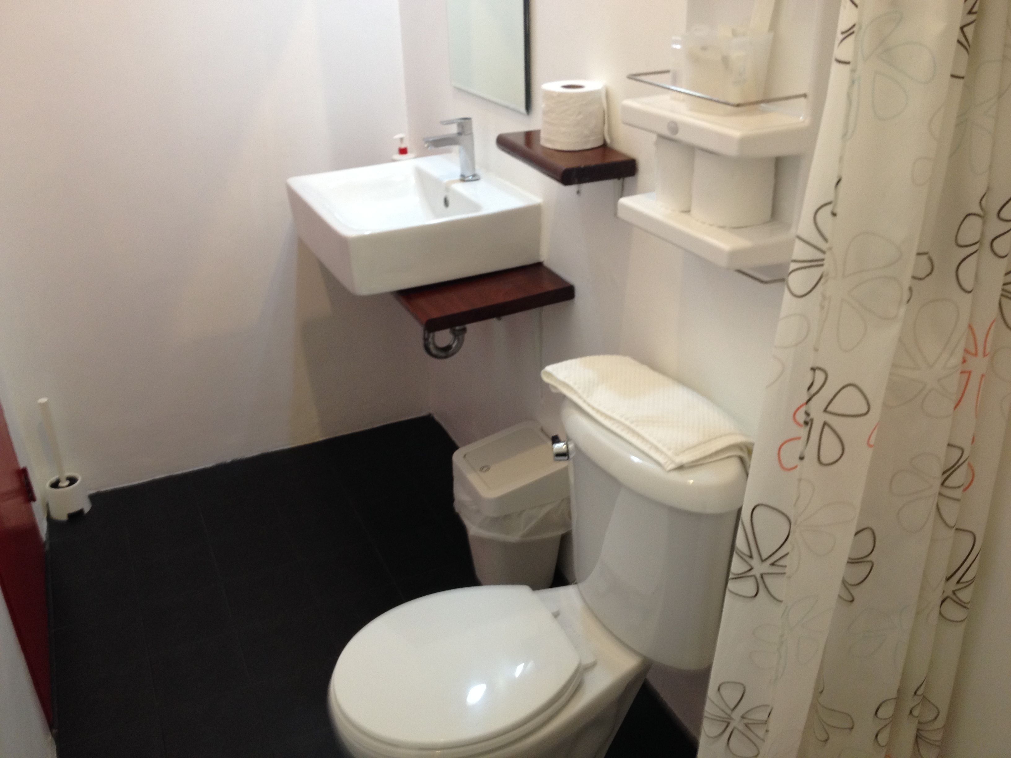 deluxe room | bathroom | shower, free toiletries, bathrobes, slippers