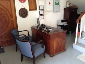 Work in comfort with a desk, chair, and ample space for productivity.