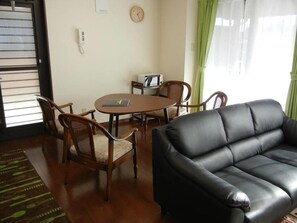 32-inch flat-screen TV with satellite channels, LCD TV, DVD player
