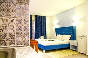 Chambre Confort double | 1 chambre, minibar, coffre-fort, rideaux d’obscurcissement