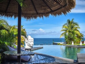 Outdoor pool, pool umbrellas, pool loungers