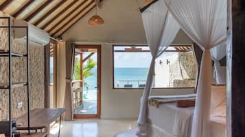 Premium Ocean View Lodge | Minibar, in-room safe, individually decorated, blackout curtains