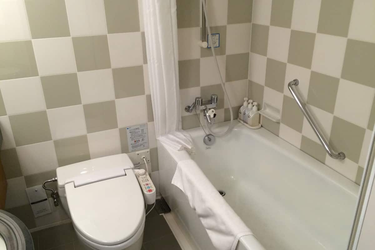 free toiletries, slippers, electronic bidet, towels