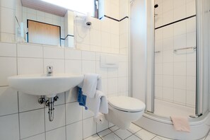 Shower, free toiletries, hair dryer, towels