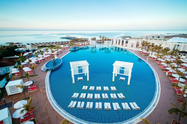 Indoor pool, 2 outdoor pools, open 8:00 AM to 7:00 PM, pool umbrellas