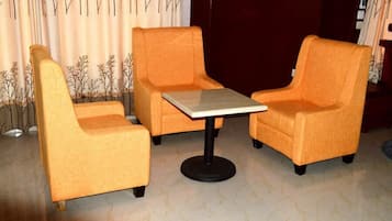 Executive Suite, 1 Bedroom | Living area | 32-inch flat-screen TV with cable channels, TV