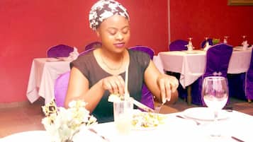 Breakfast, lunch served; local and international cuisine, pool views