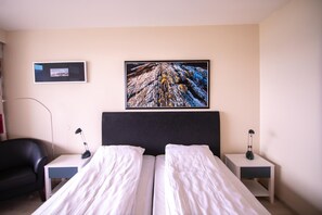 Colchones con acolchado adicional, cortinas opacas, wifi gratis