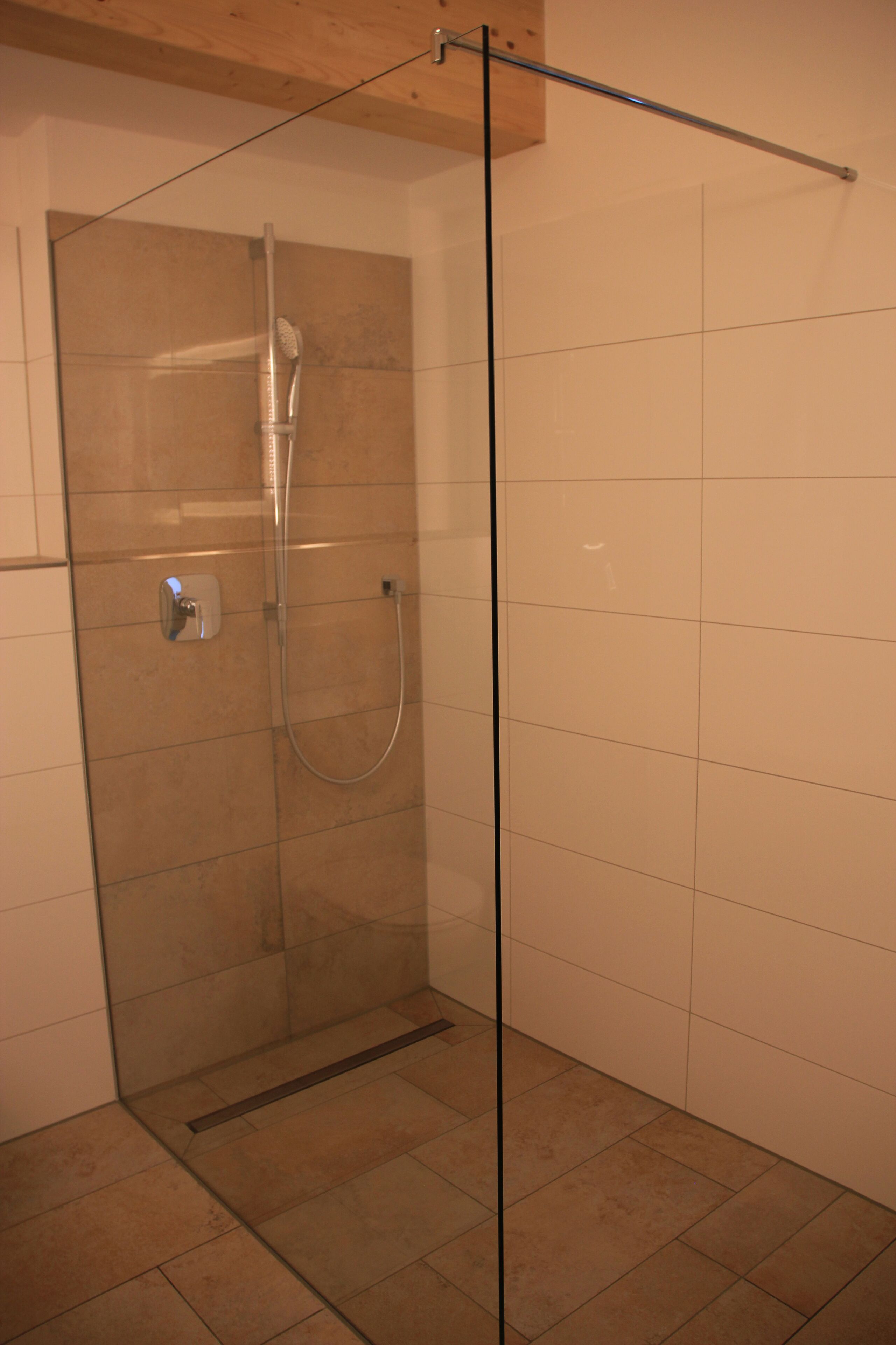 deluxe quadruple room | bathroom | shower, free toiletries, hair dryer, towels