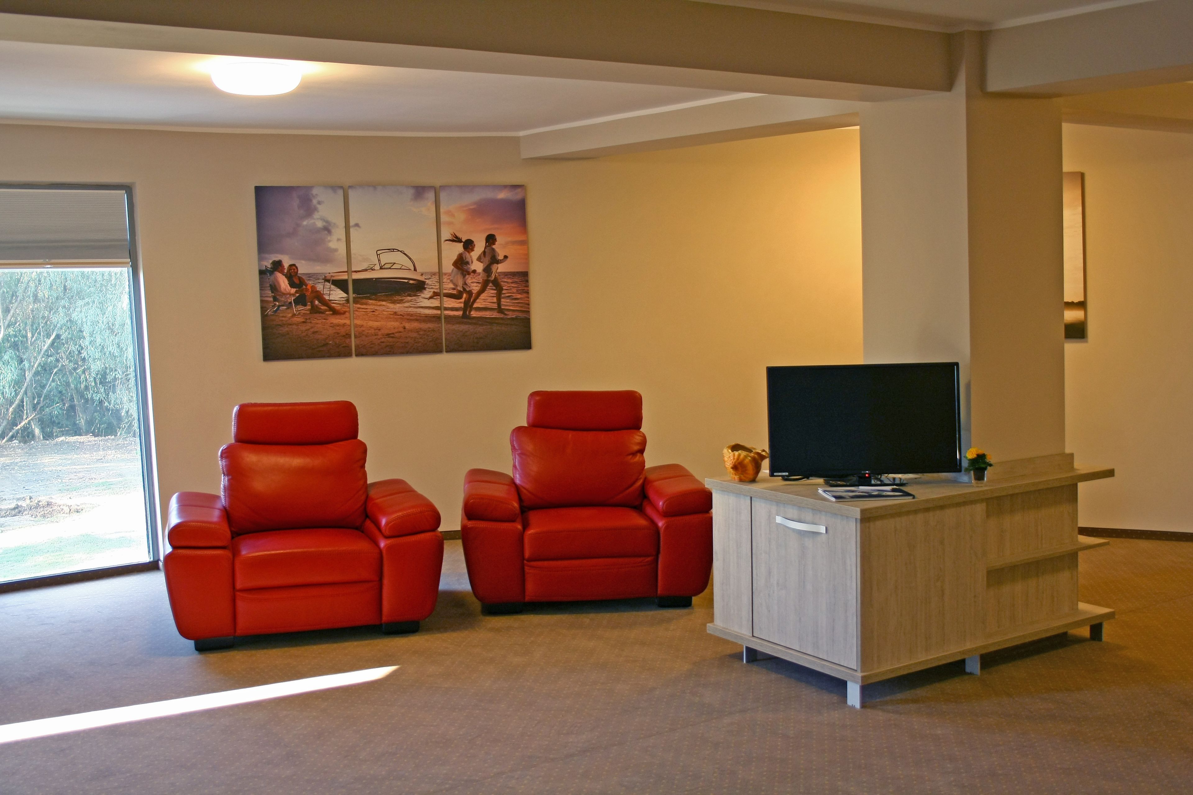 suite, balcony | living area | flat-screen tv