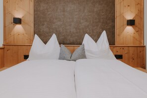 Double Room Attic (roof slope - bathtub with hand shower - standing height of approx. 165 cm) | In-room safe, blackout drapes, free WiFi, bed sheets