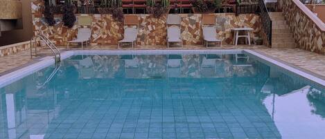 Outdoor pool, sun loungers