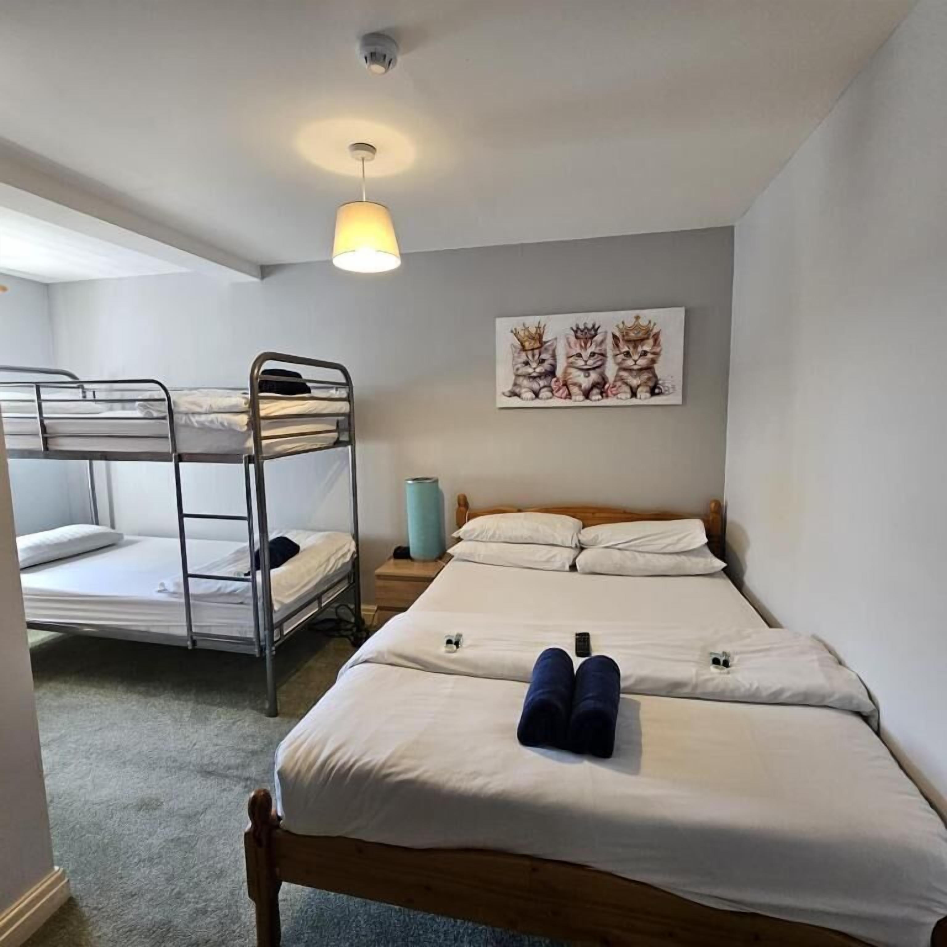 Chambre Quadruple Familiale | Rideaux occultants, Wi-Fi gratuit