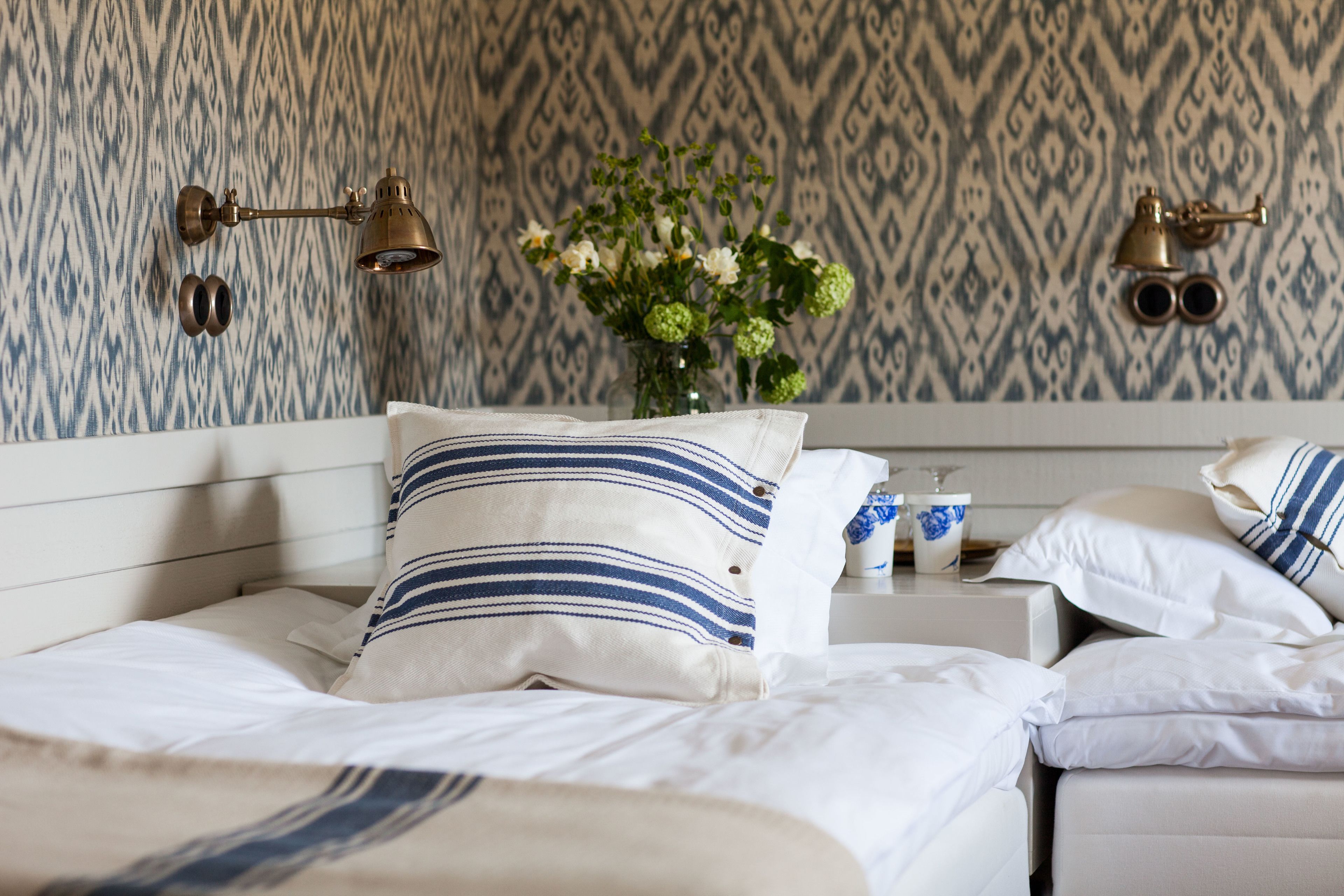 Phòng 2 giường đơn Deluxe | Khu phòng khách | TV màn hình phẳng 