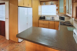 6 Fairway 2 | Private kitchen | Fridge, microwave, electric kettle, dining tables
