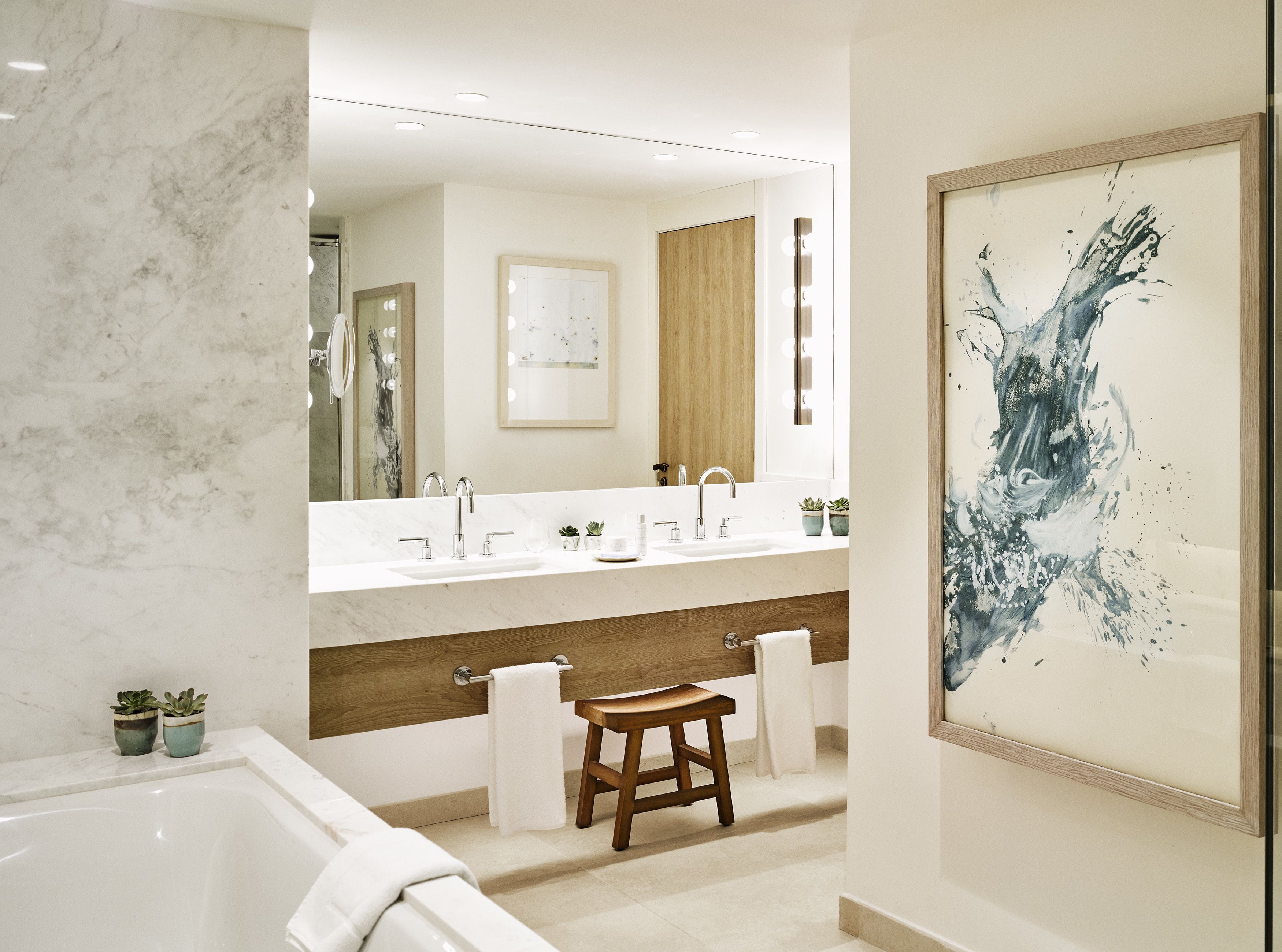 designer toiletries, hair dryer, bathrobes, towels