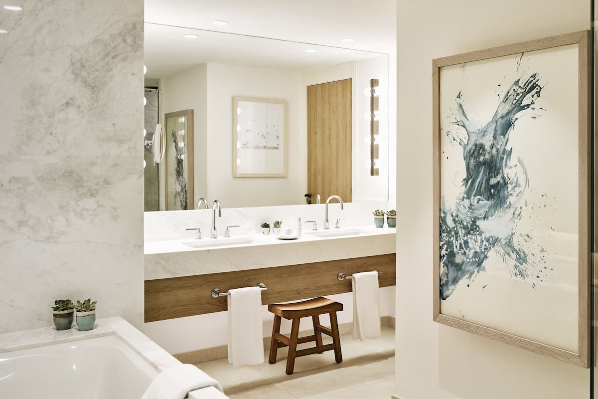 designer toiletries, hair dryer, bathrobes, towels