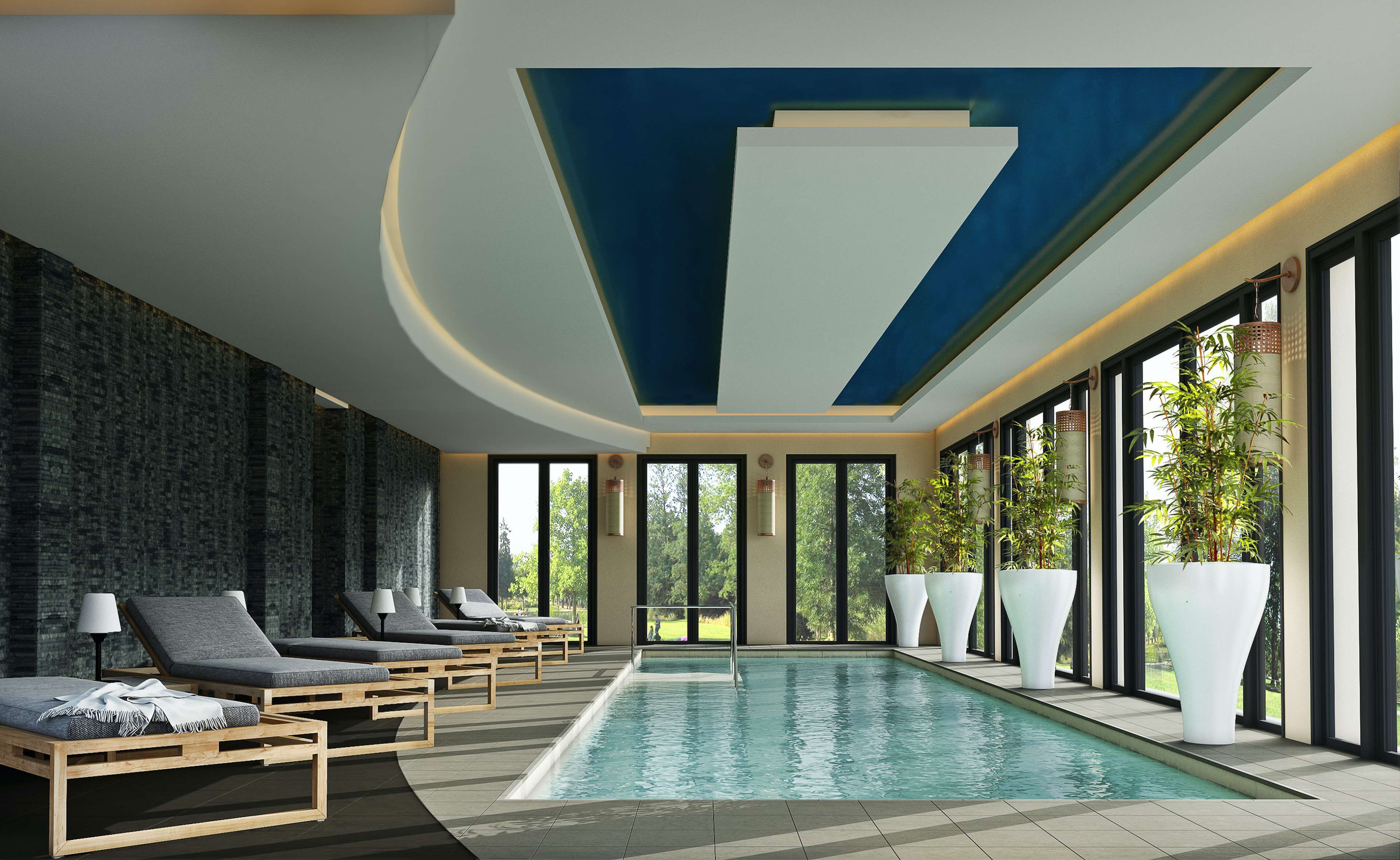 Innenpool, 3 Außenpools, Sonnenschirme