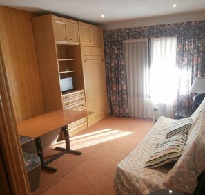 Apartamento, 1 quarto | Sala de estar
