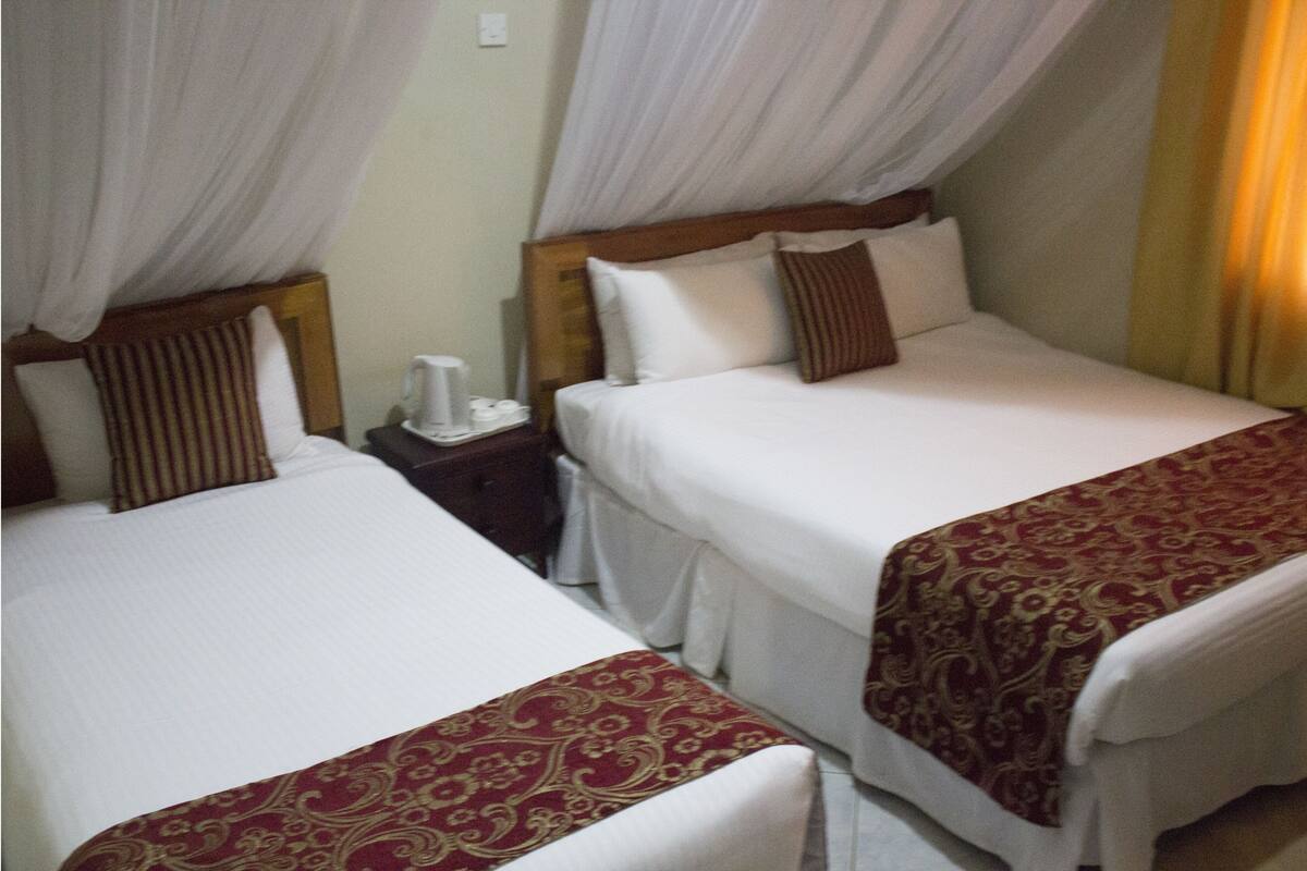 Family Room | Minibar, in-room safe, desk, WiFi (free)
