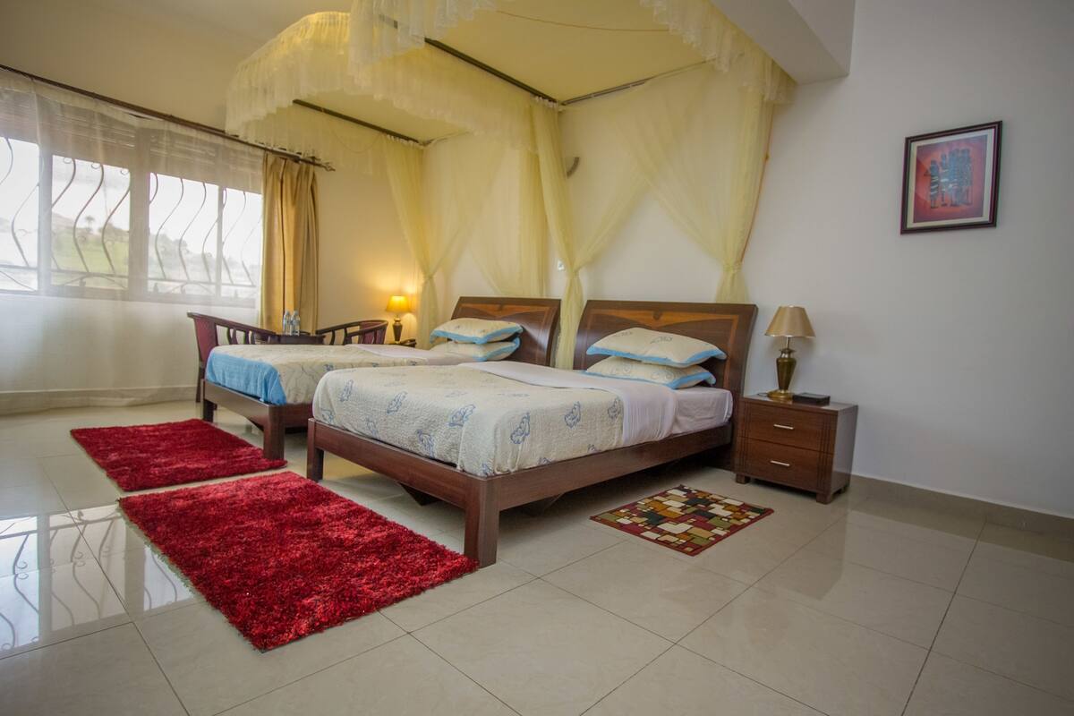Habitación Deluxe con 2 camas individuales | Escritorio y wifi gratis