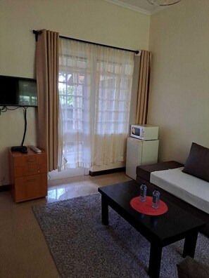 Apartment, 1 Schlafzimmer | Wohnbereich | Fernseher