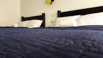 Double Room, Multiple Beds | Minibar, desk, free WiFi, bed sheets