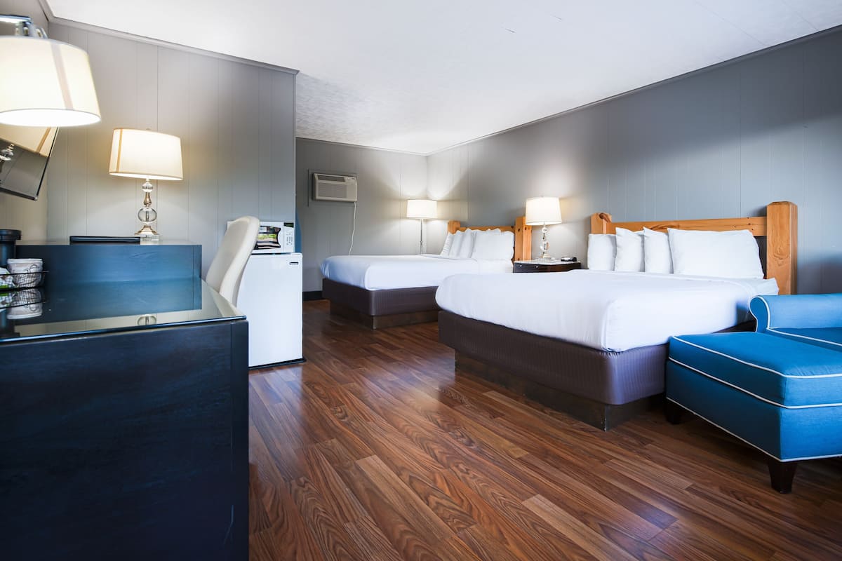 1 dormitorio, ropa de cama de alta calidad, escritorio y cortinas opacas