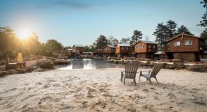 Private beach, white sand, sun loungers, beach volleyball