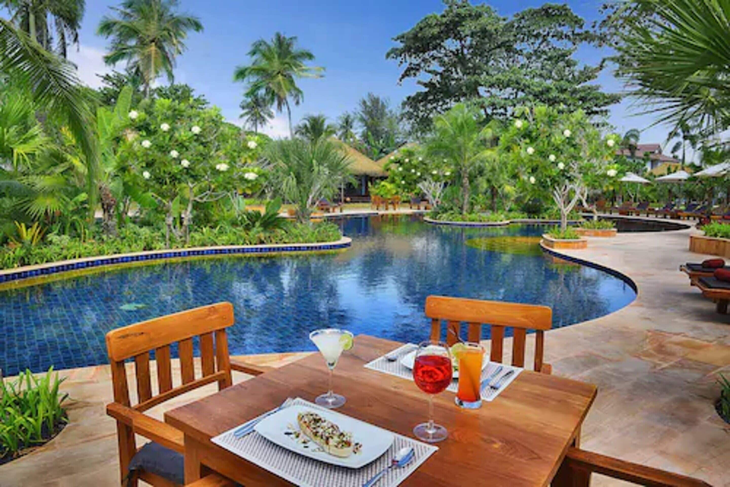 outdoor pool, pool umbrellas, pool loungers