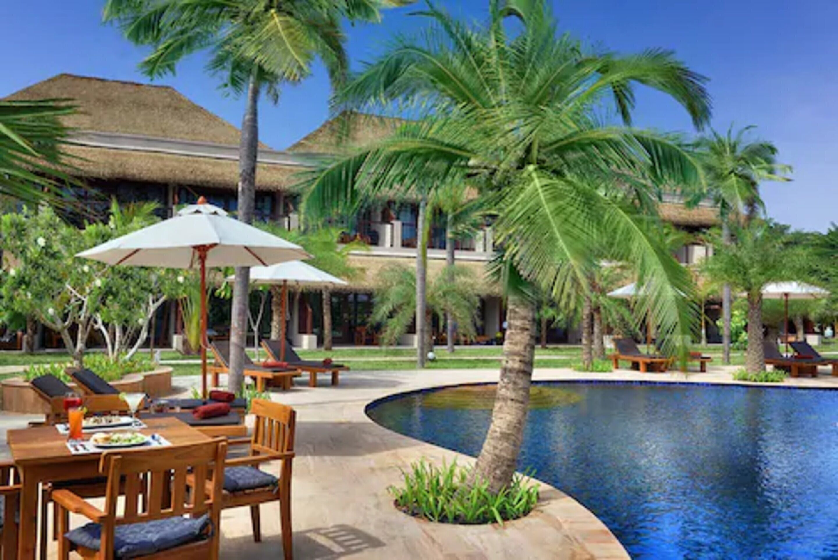 outdoor pool, pool umbrellas, pool loungers