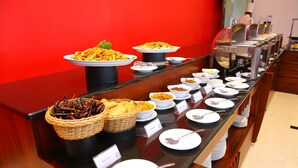 A buffet setup with various dishes and serving utensils. - Hotel Nippon Colombo (Colombo)