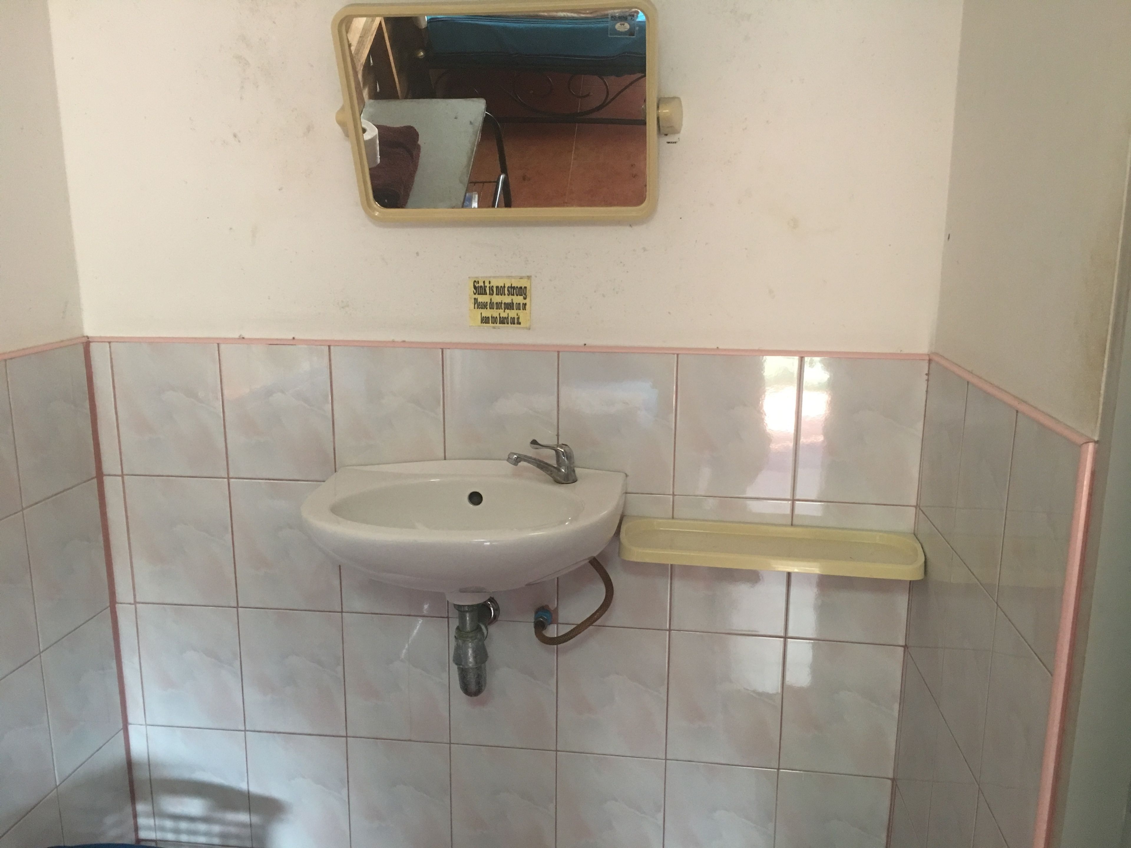 bungalow with air conditioner | bathroom | shower, rainfall showerhead, towels, soap