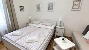 Habitación doble Confort, 1 habitación, cocineta (1) | 1 habitación, insonorización y tabla de planchar con plancha