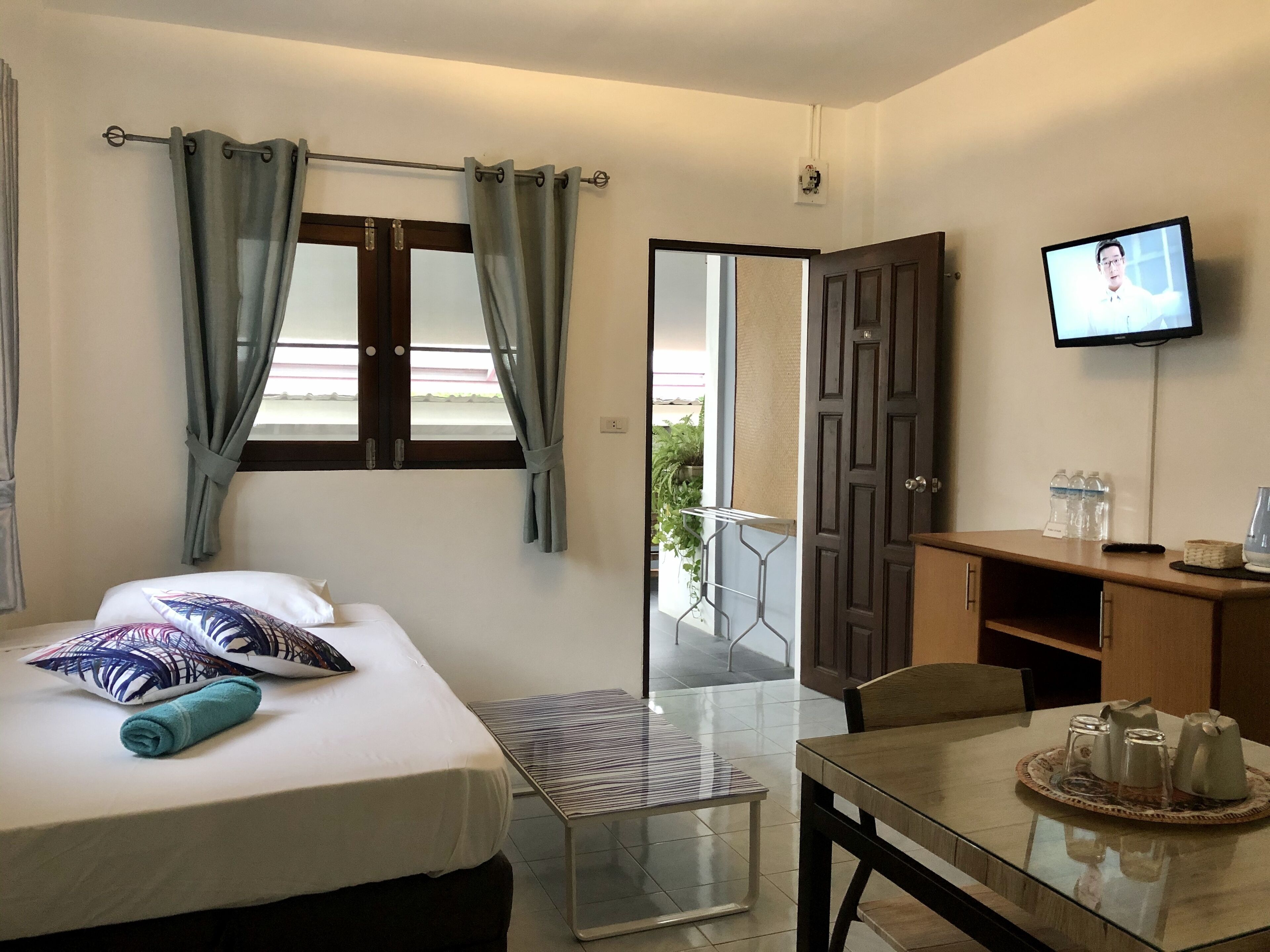 family triple room, multiple beds, terrace | living area