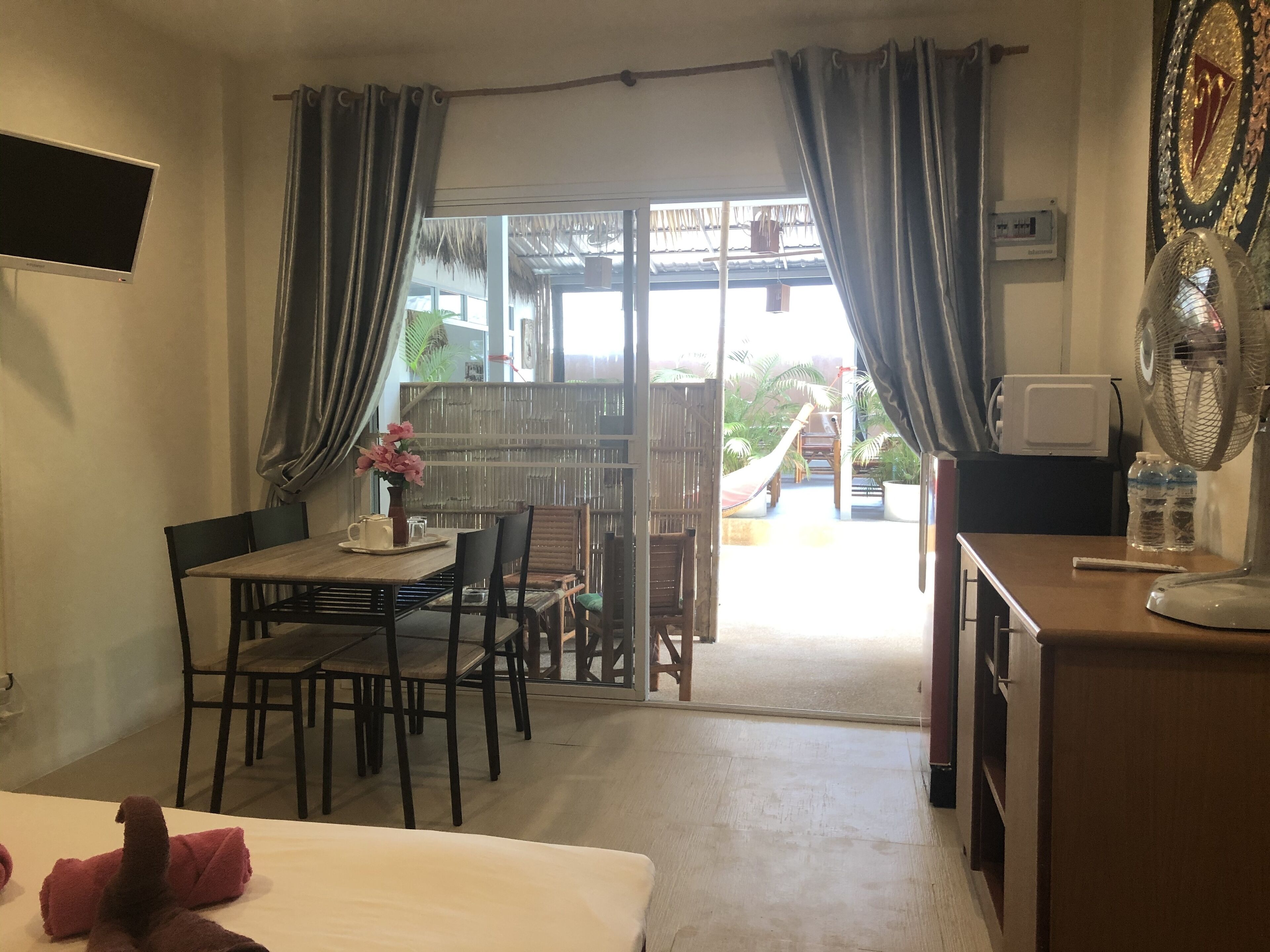 family quadruple room, multiple beds, terrace | living area