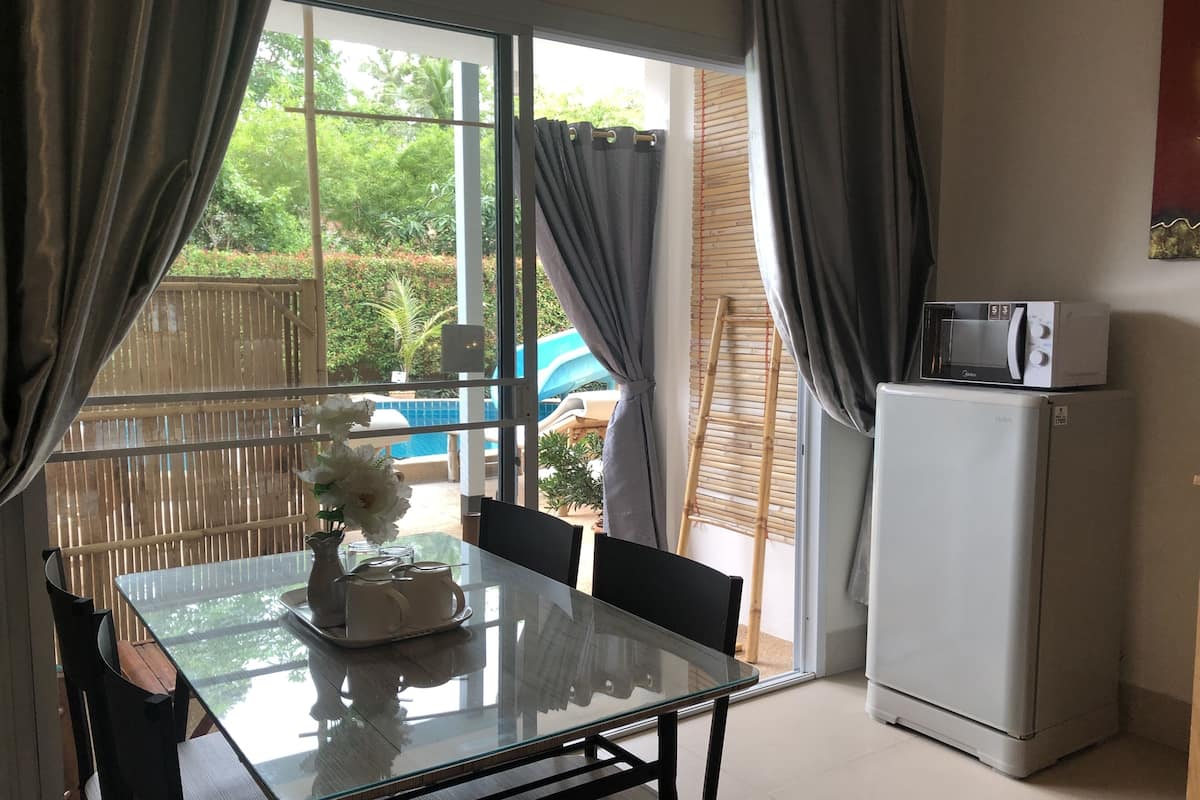 family quadruple room, multiple beds, terrace | living area