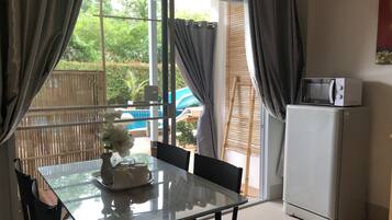 Family Quadruple Room, Multiple Beds, Terrace | Living area