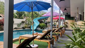 Outdoor pool, pool umbrellas, pool loungers