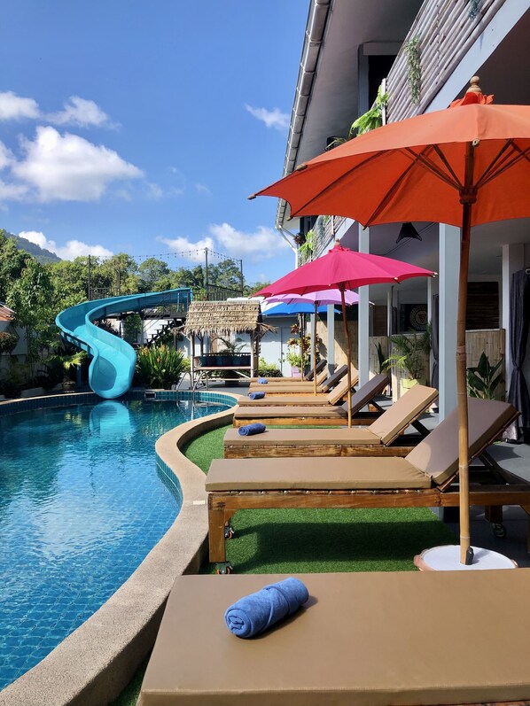 Outdoor pool, pool umbrellas, pool loungers