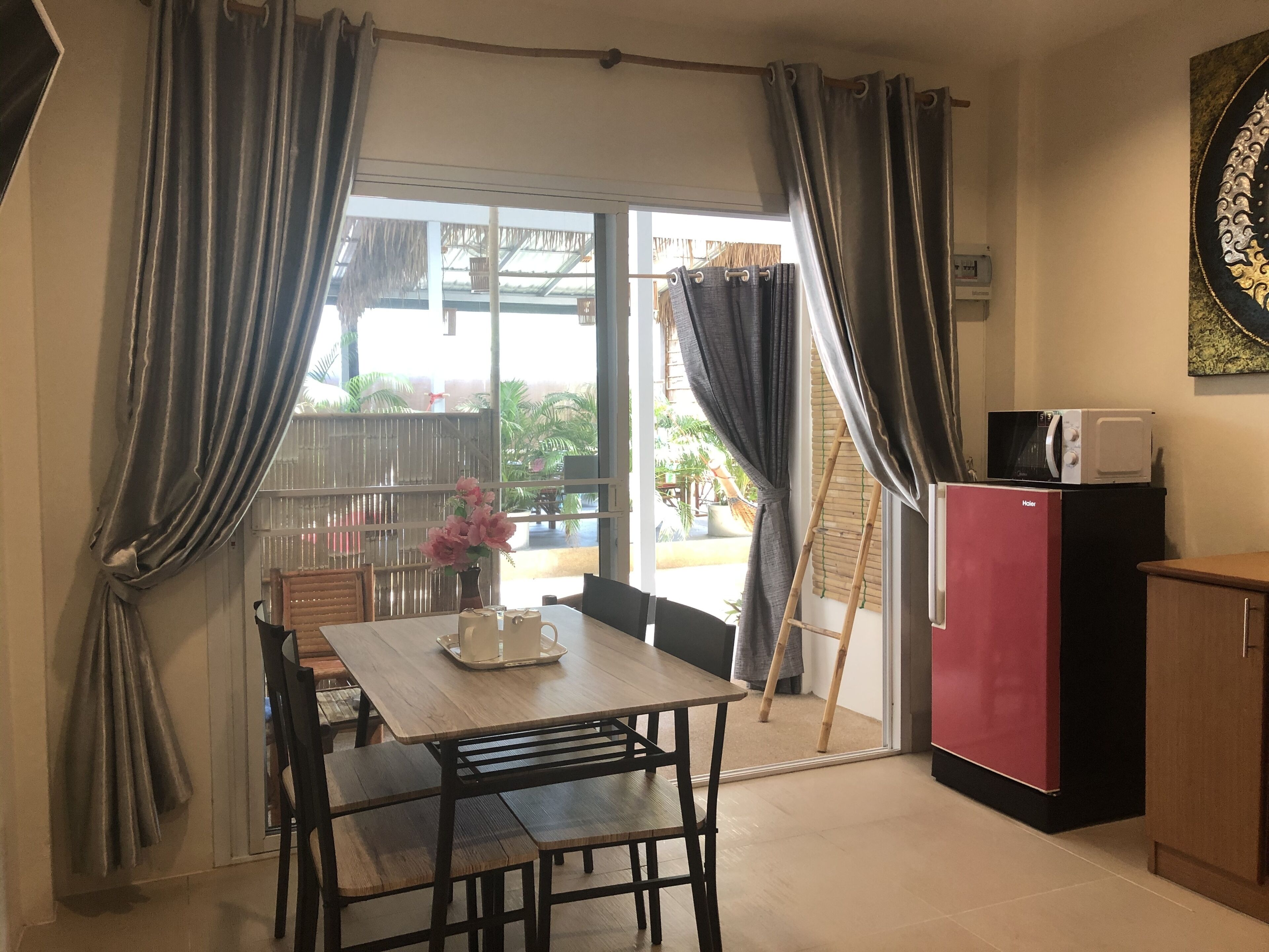 family quadruple room, multiple beds, terrace | living area