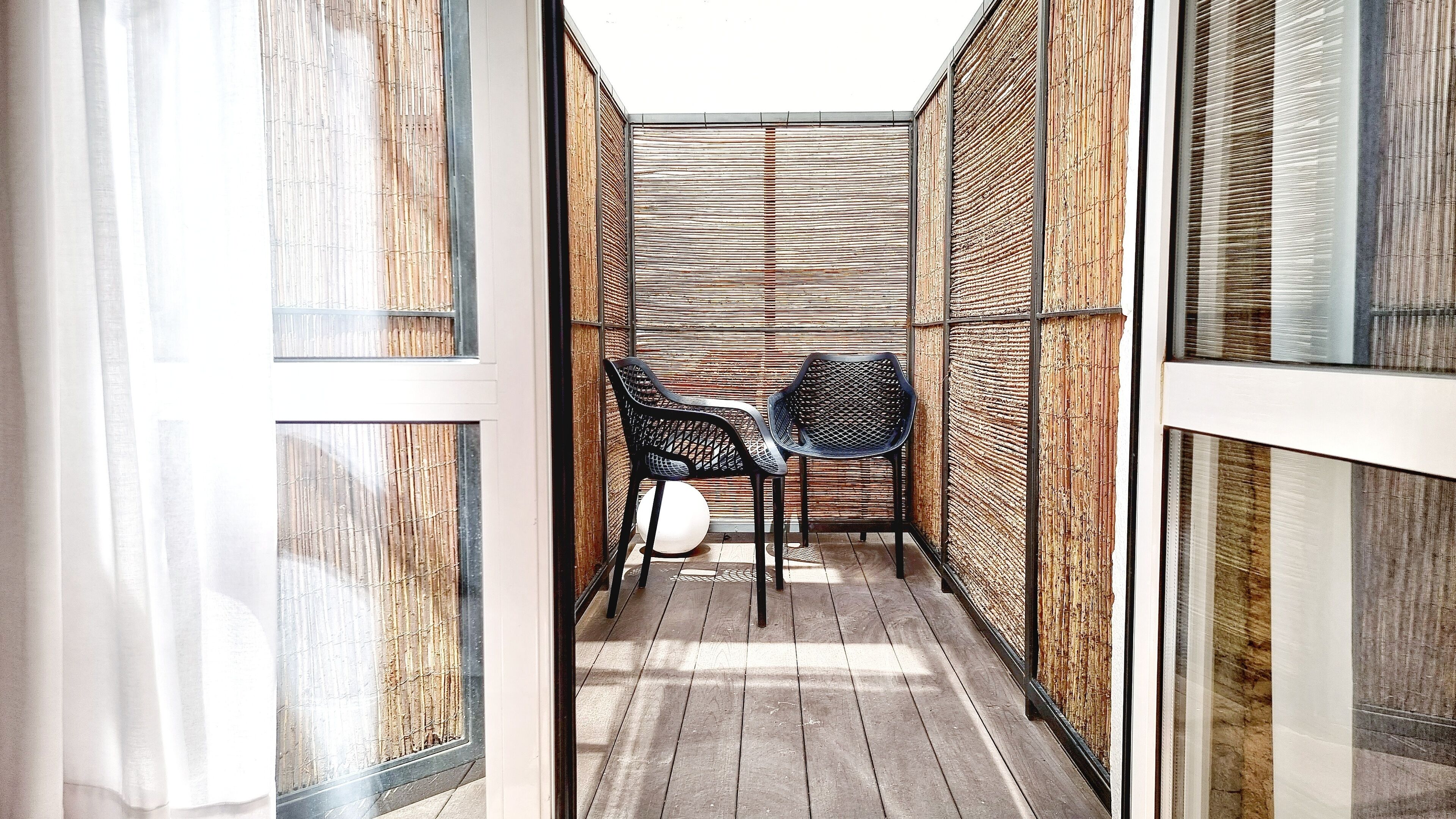 interior double room with patio | in-room safe, desk, laptop workspace, blackout curtains