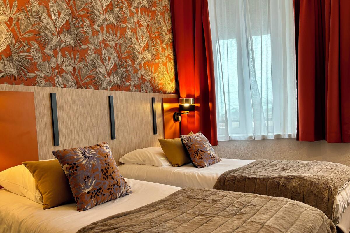 Premium bedding, pillow-top beds, desk, laptop workspace
