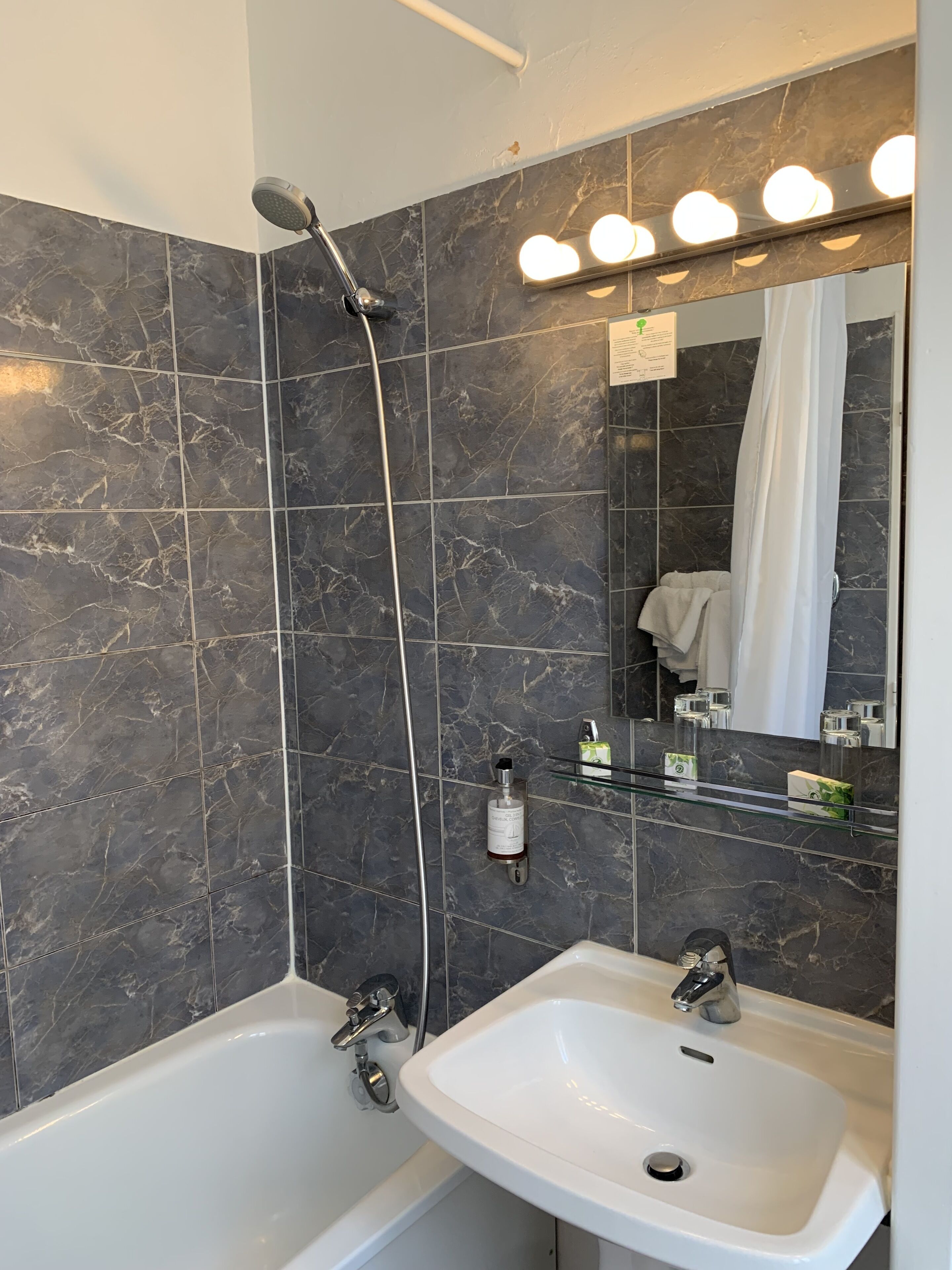 comfort twin room | bathroom | eco-friendly toiletries, hair dryer, towels, soap