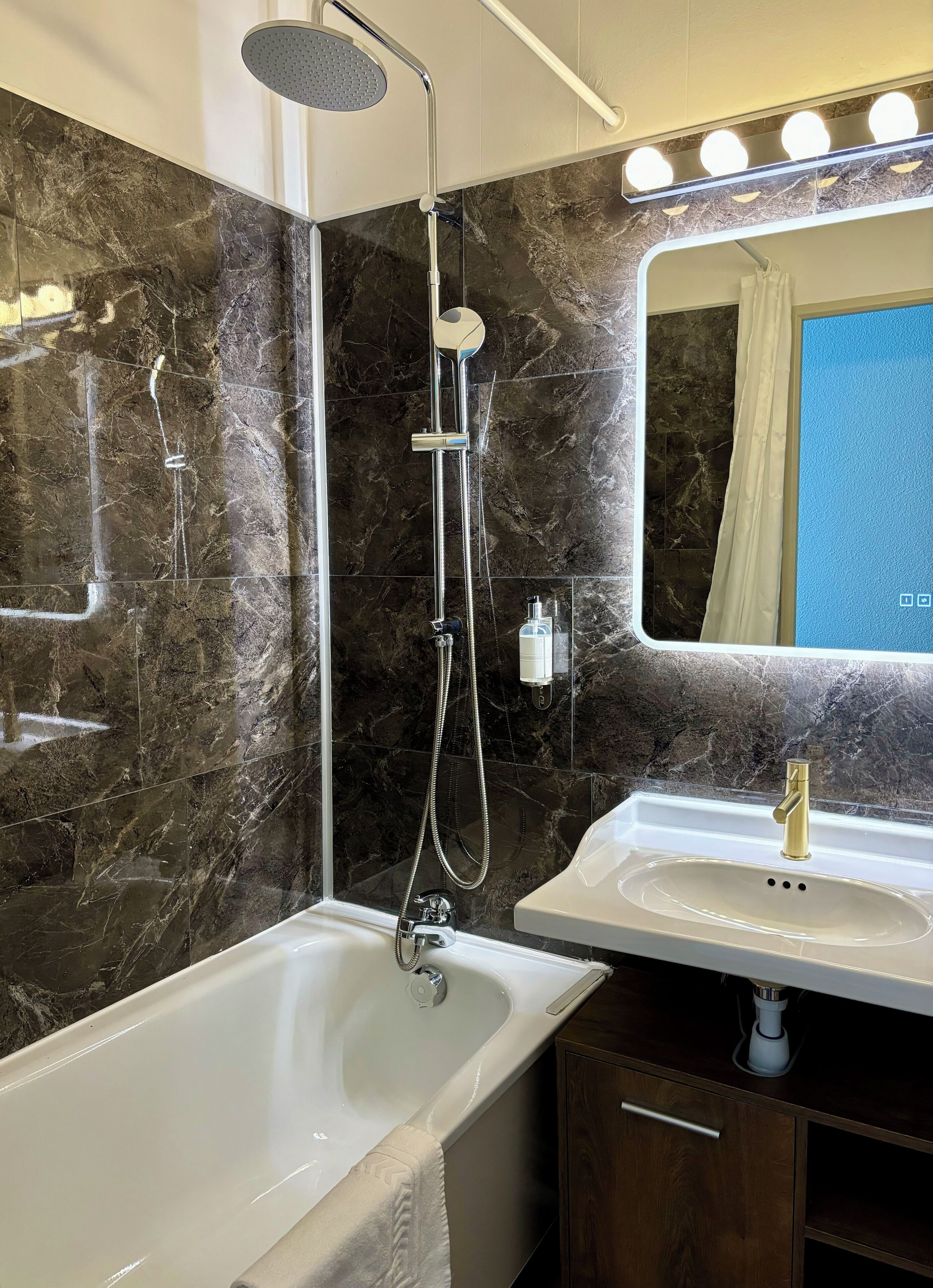 economy single room | bathroom | eco-friendly toiletries, hair dryer, towels, soap